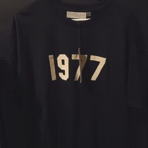 Nwts Essentials 1977 shirt